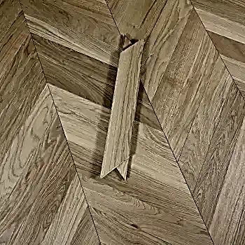 Luxury Chevron Invisible Oak Oiled Flooring showcasing brushed European oak with seamless V-shaped pattern and invisible oiled finish.