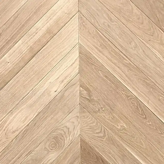 Close-up view of Chevron Prime Unfinished Oak Wood Flooring 92mm highlighting authentic oak grain and precision parquet pattern