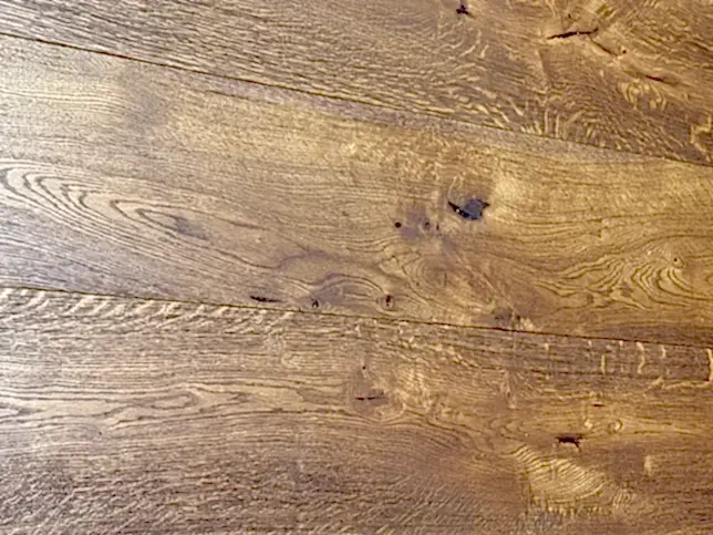Angled side view of Ditorian Oak flooring showcasing grain variation and brushed detail