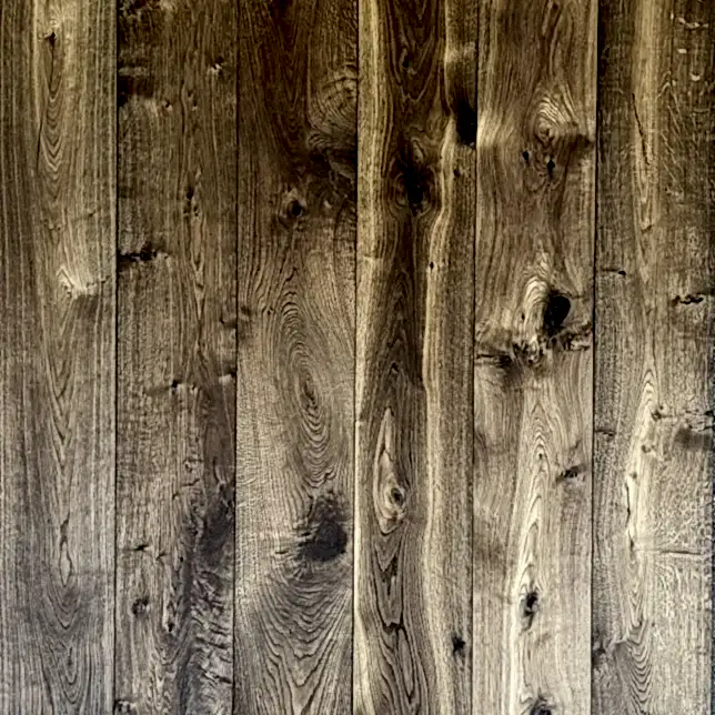 Close-up view of Heritage XL Smoked Oak brushed and oiled engineered flooring showing the rich grain and smoked finish