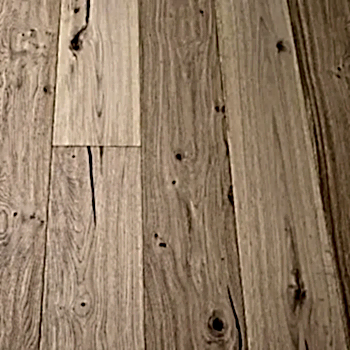 Close-up view of Eco Range Bourbon Vintage Oak flooring with handscraped texture and warm oiled finish